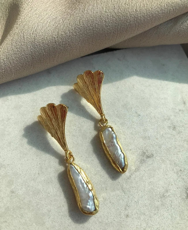 Boucles d’oreilles élégantes en perles baroques