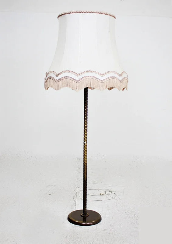 Lampadaire baroque en laiton